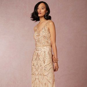 Glamorous Adrianna Papell's champagne Ascott gown